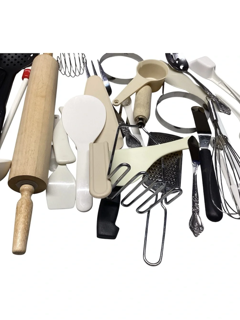 A little over 4 pounds of Assorted Kitchen Utensils
